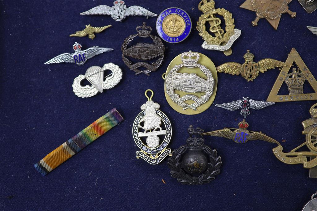 A quantity of Military and Civilian medals / badges